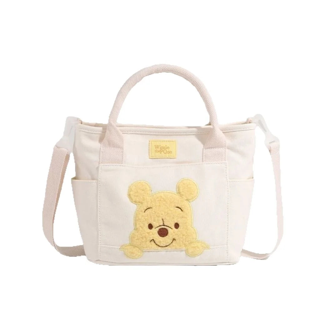 The Mesuca Cute Cartoon Bear Canvas Tote Bag Women Casual Handbag Detachable Shoulder Strap Crossbody Purse, Large Capacity Multi‑Pocket Daily Travel Shopping Shoulder Bag
