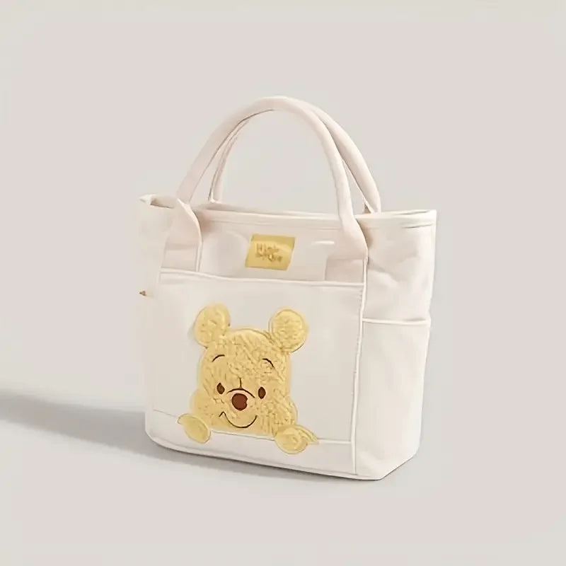 The Mesuca Cute Cartoon Bear Canvas Tote Bag Women Casual Handbag Detachable Shoulder Strap Crossbody Purse, Large Capacity Multi‑Pocket Daily Travel Shopping Shoulder Bag